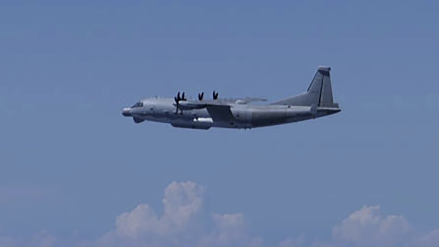 Japan says it will watch China's military activity after Beijing admits violating its airspace - Japan Today