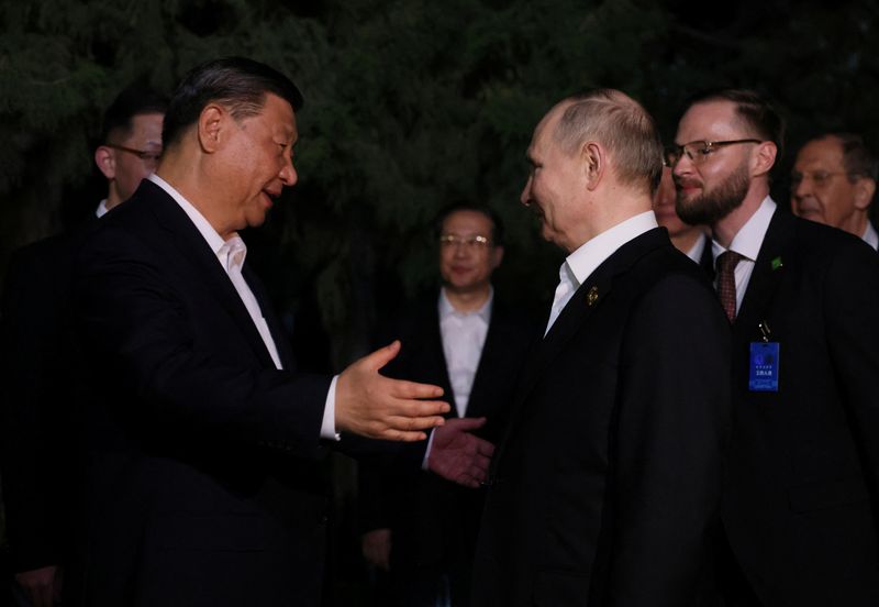 Hugs but not the full socialist-era kiss for Putin, Xi in Beijing - Yahoo! Voices